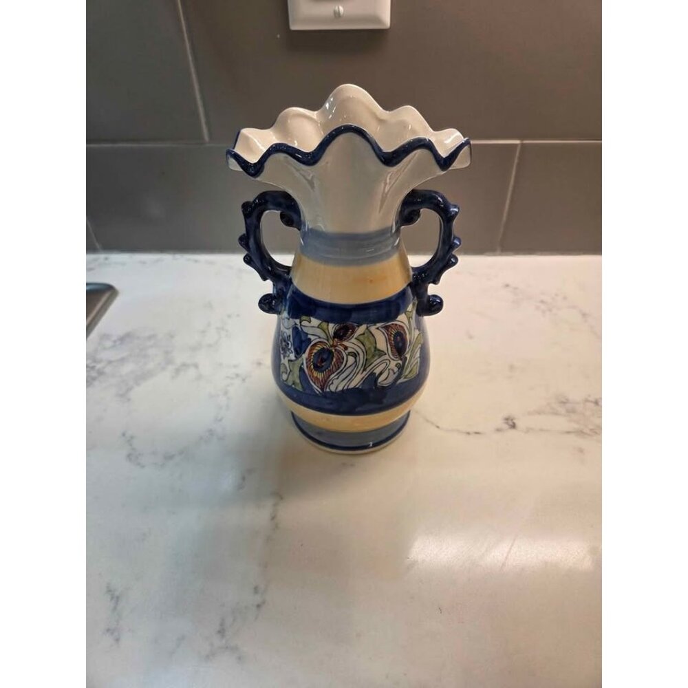 Vase with handles and fluted top